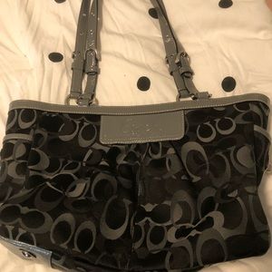 Black and gray coach purse